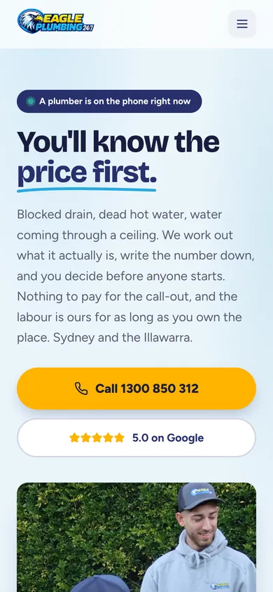 Eagle Plumbing mobile homepage with a prominent yellow phone button