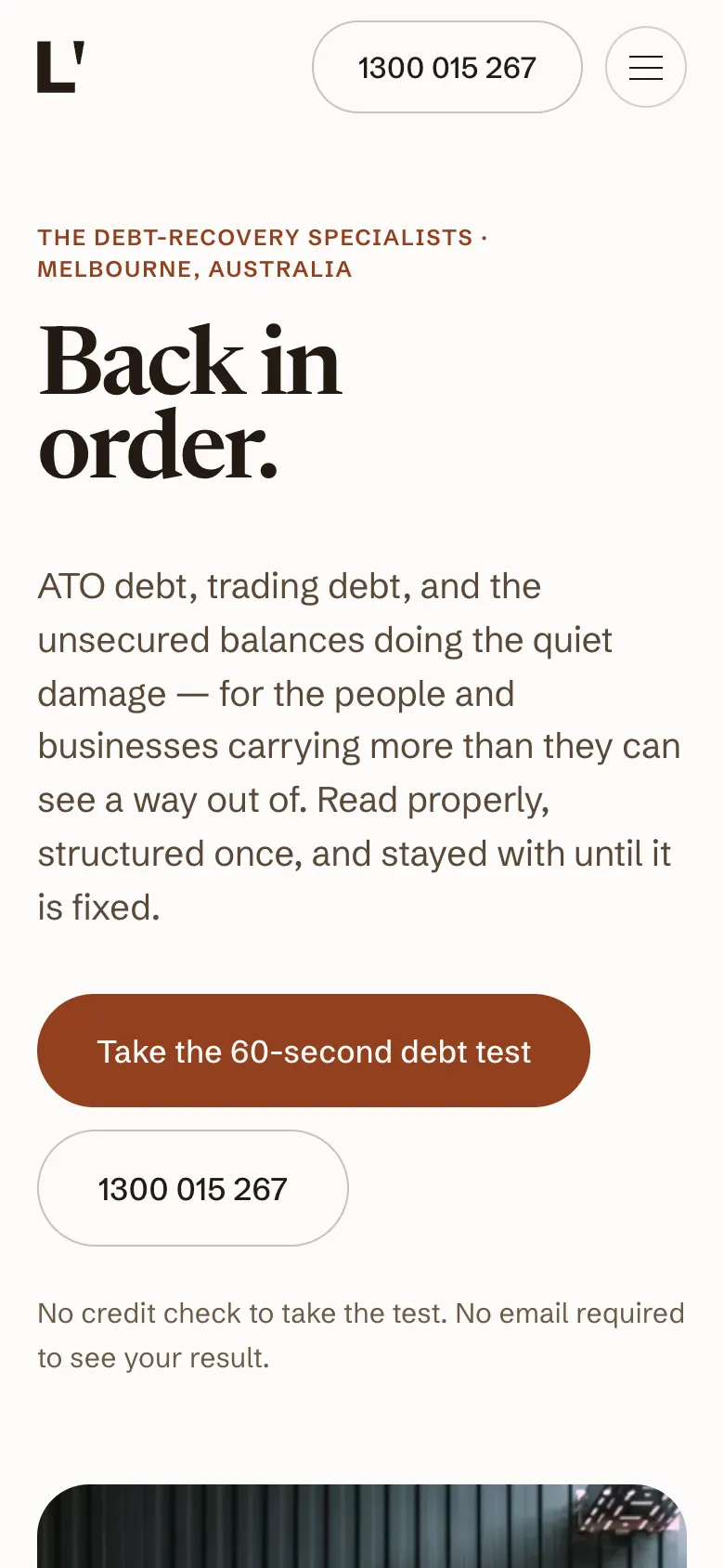 WELND home page on a phone with the debt test button above the phone number